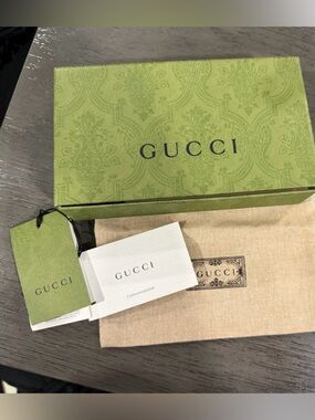 Gucci box, dusty, and tags